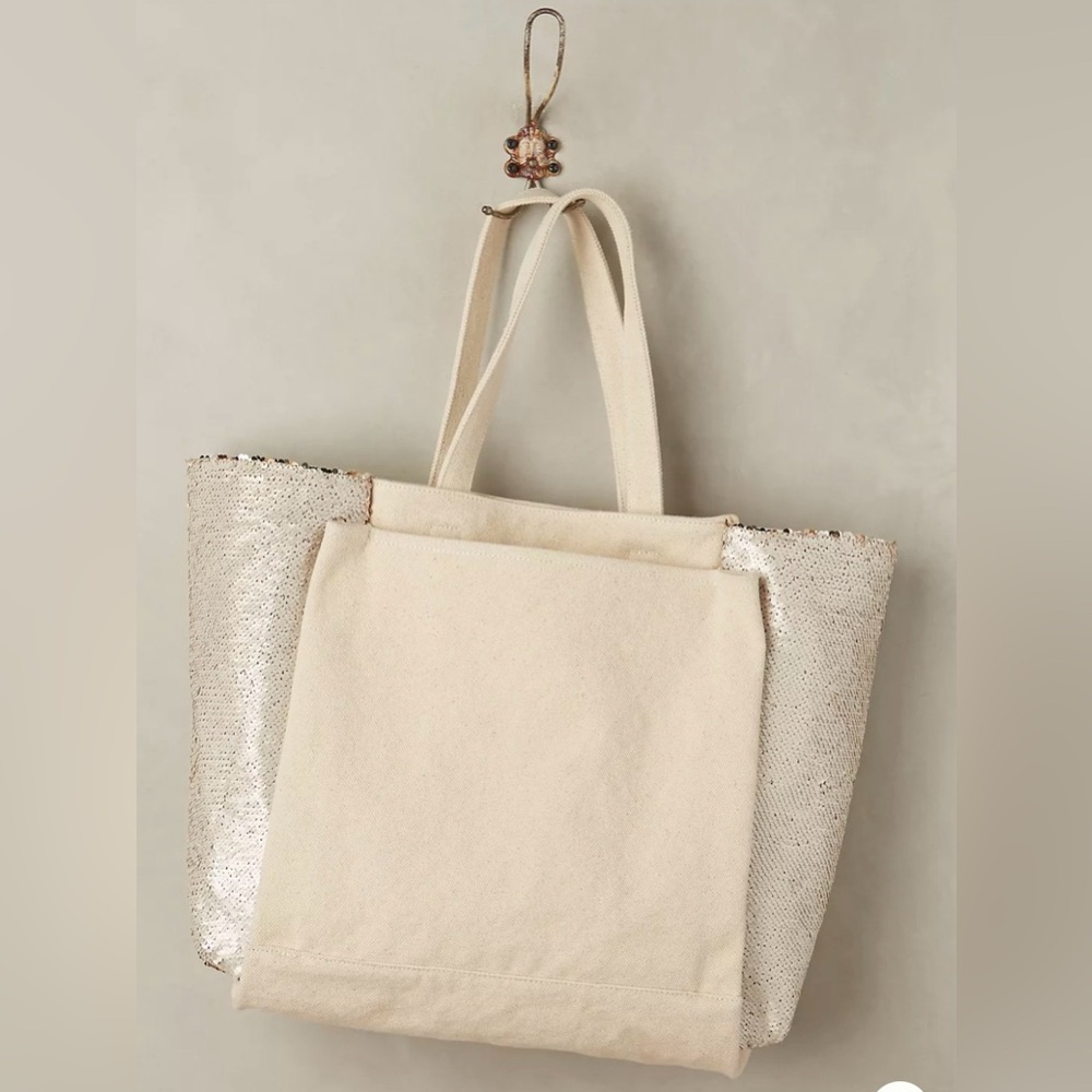 Anthropologie, Sequin glimmer tote bag. Cream canvas tote with gold sequins.